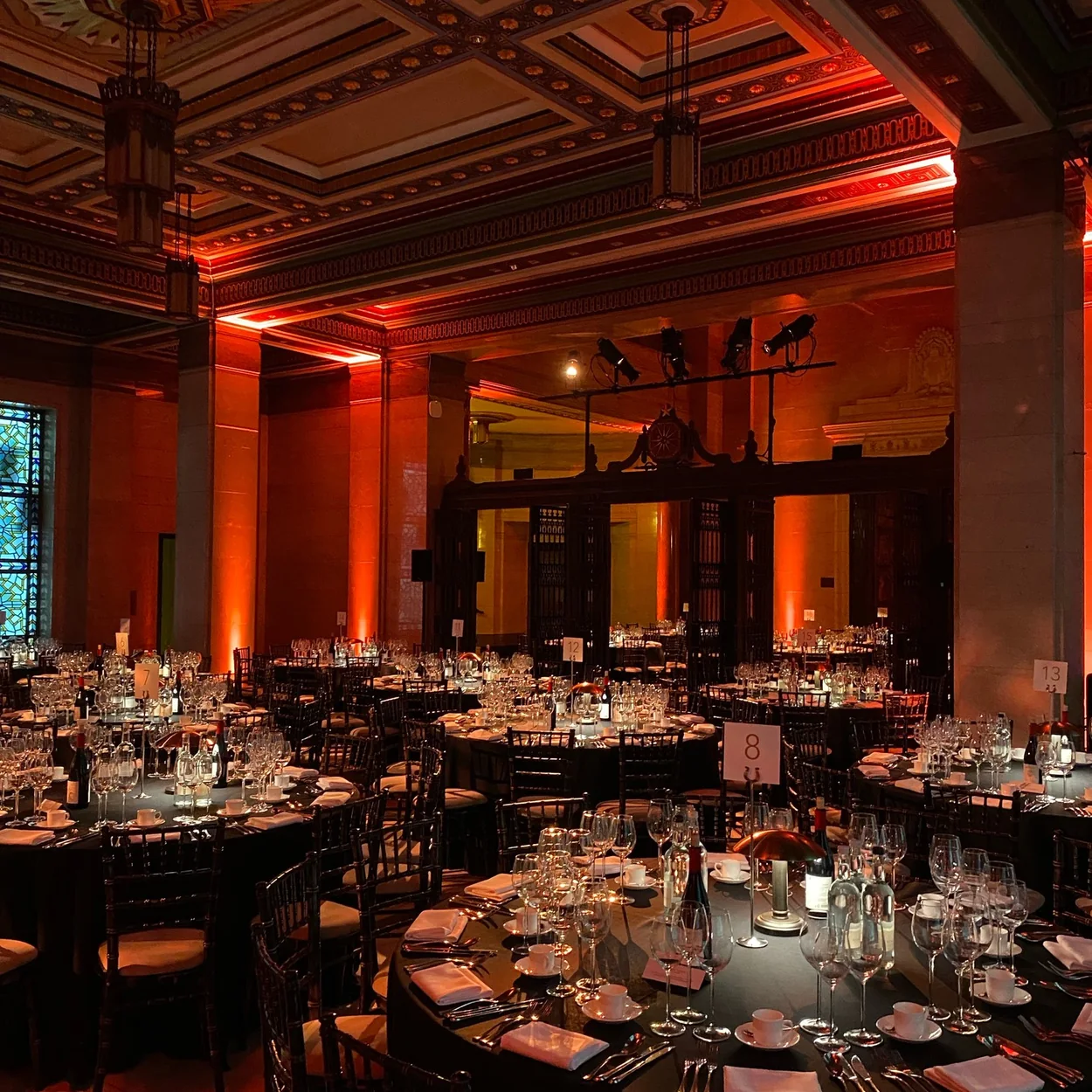 60 Great Queen Street gala dinner tables under red lighting