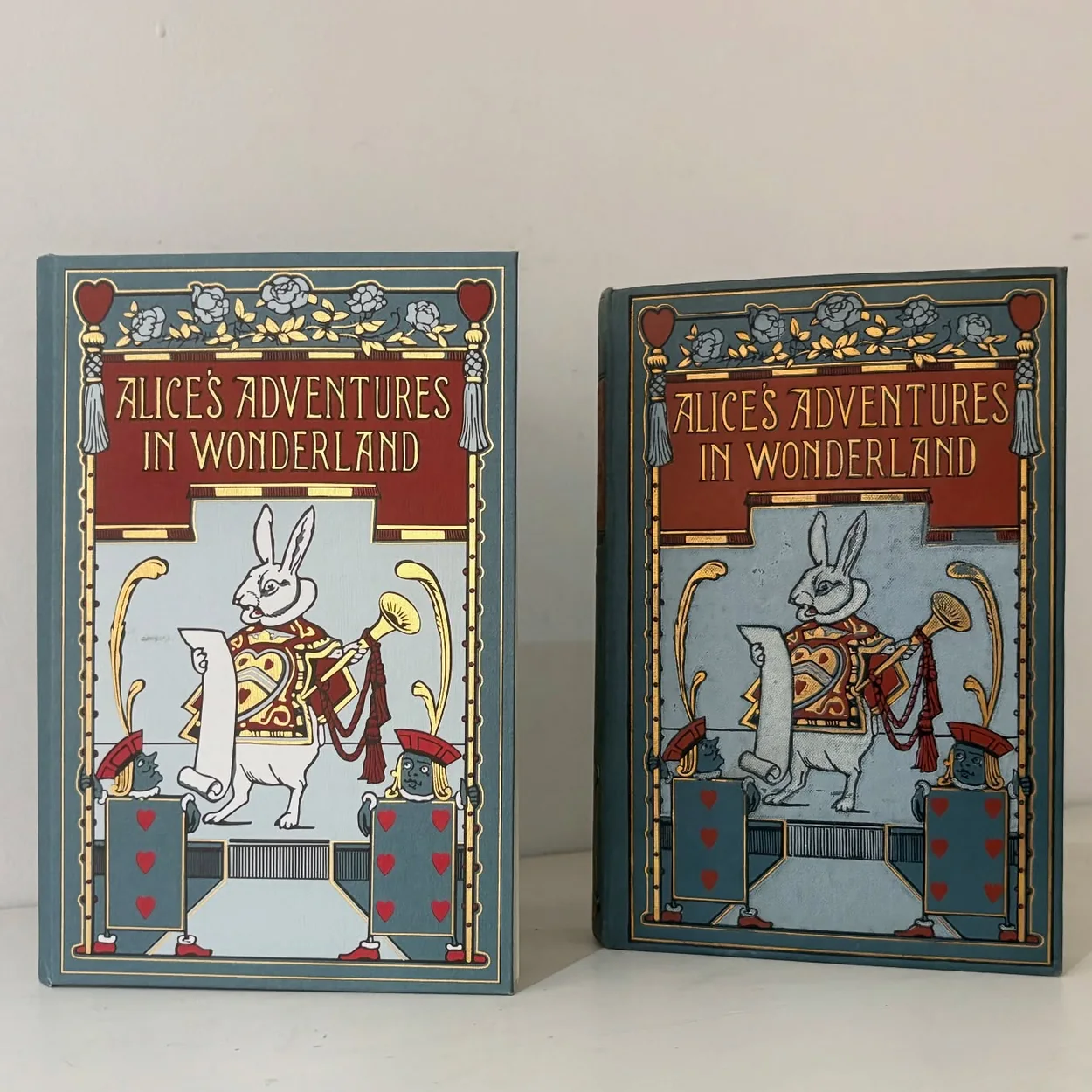 Alice Through the Looking Glass pair of illustrated Alice's Adventures in Wonderland editions