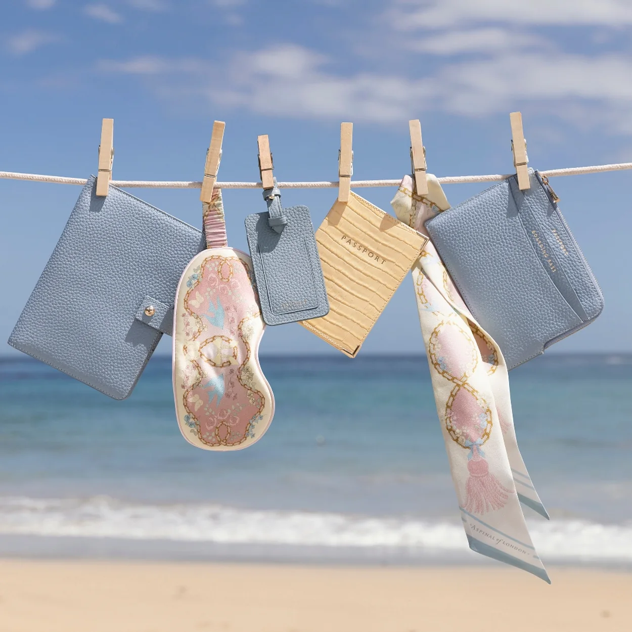 Aspinal of London small leather goods, passport covers and silk scarf