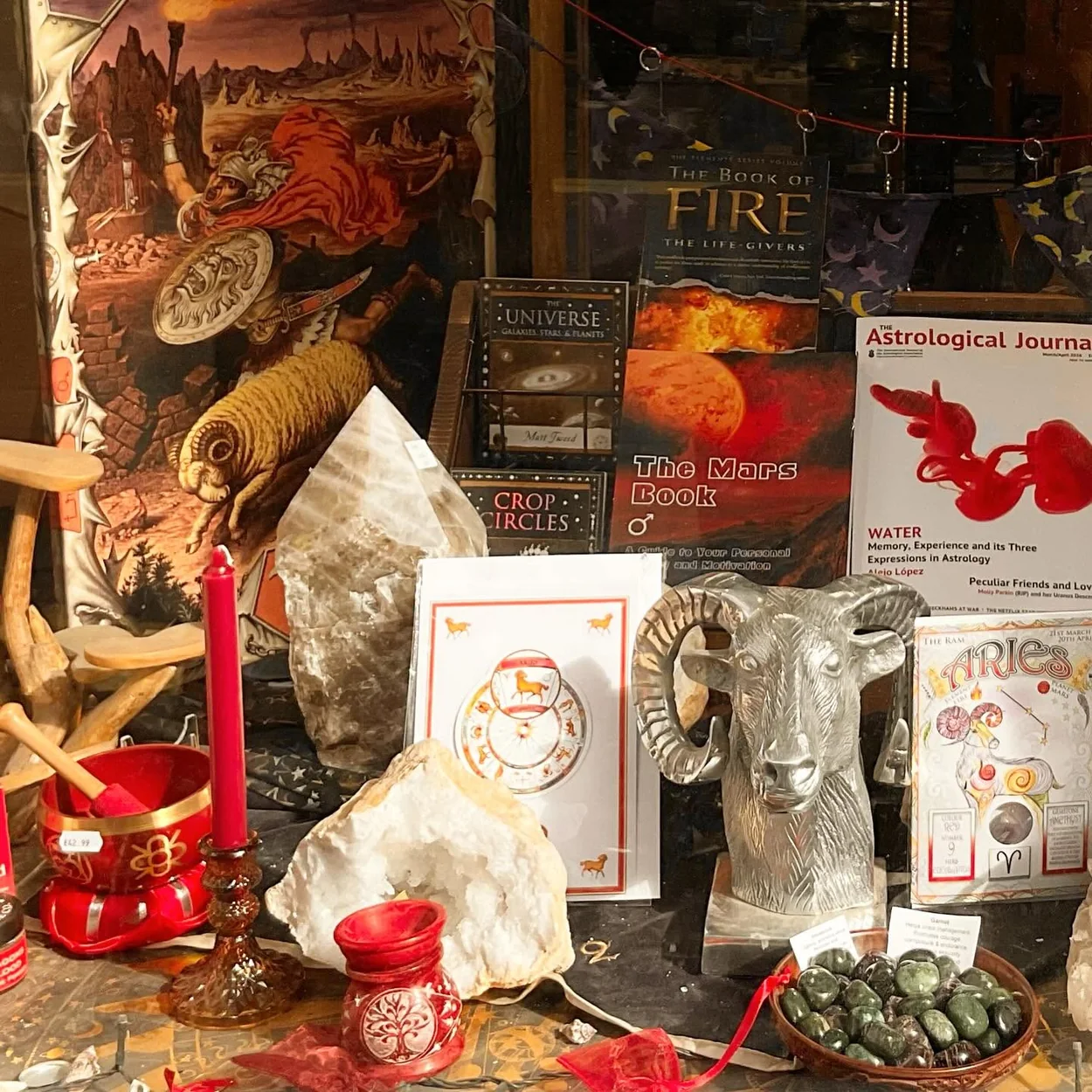 The Astrology Shop display of crystals, candles and astrology books