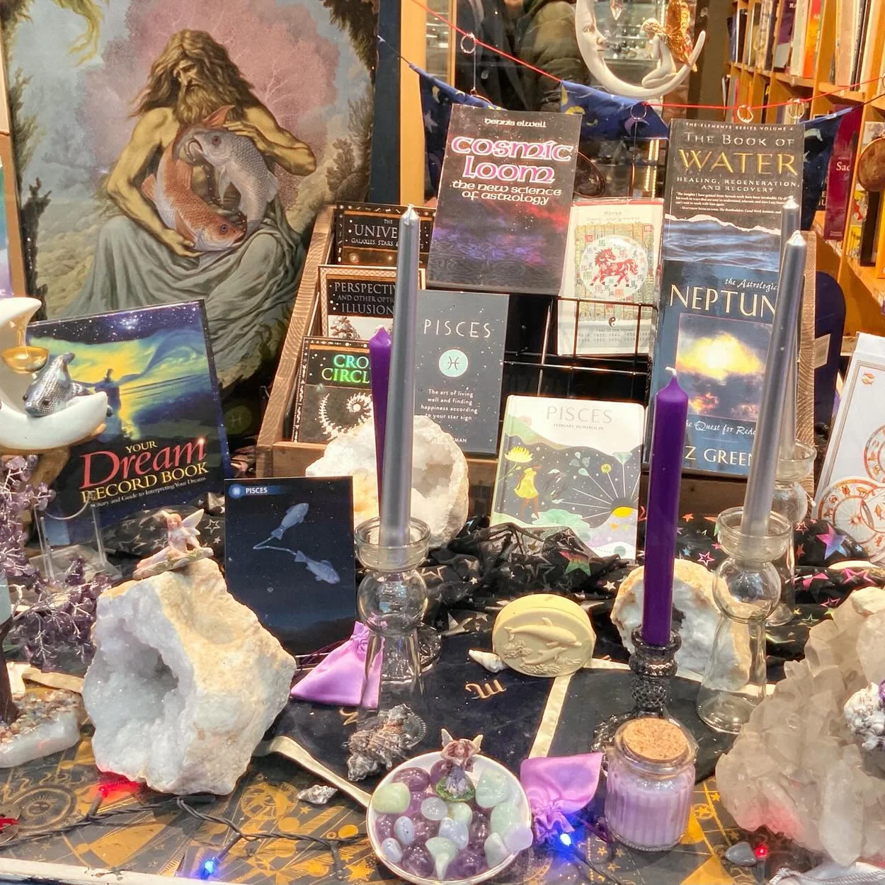 The Astrology Shop shelf of tarot decks, crystals and candles