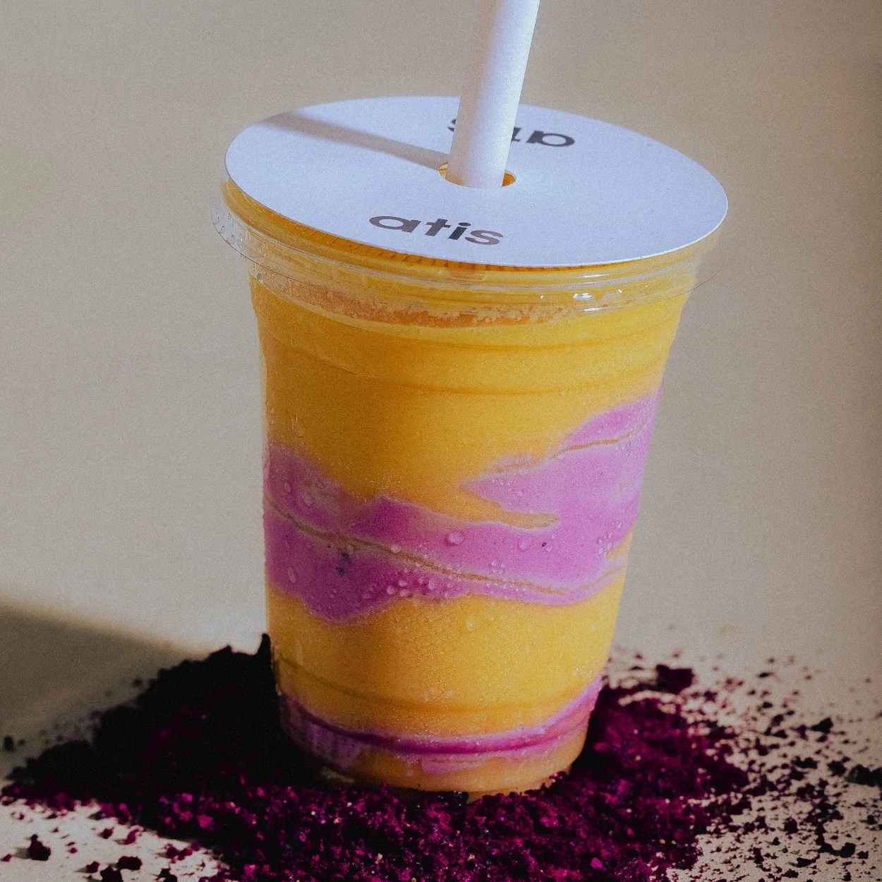 Atis mango and berry layered smoothie