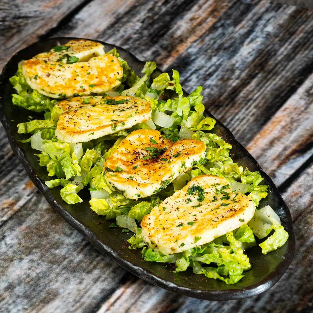 Bab Mansour grilled halloumi on a bed of lettuce