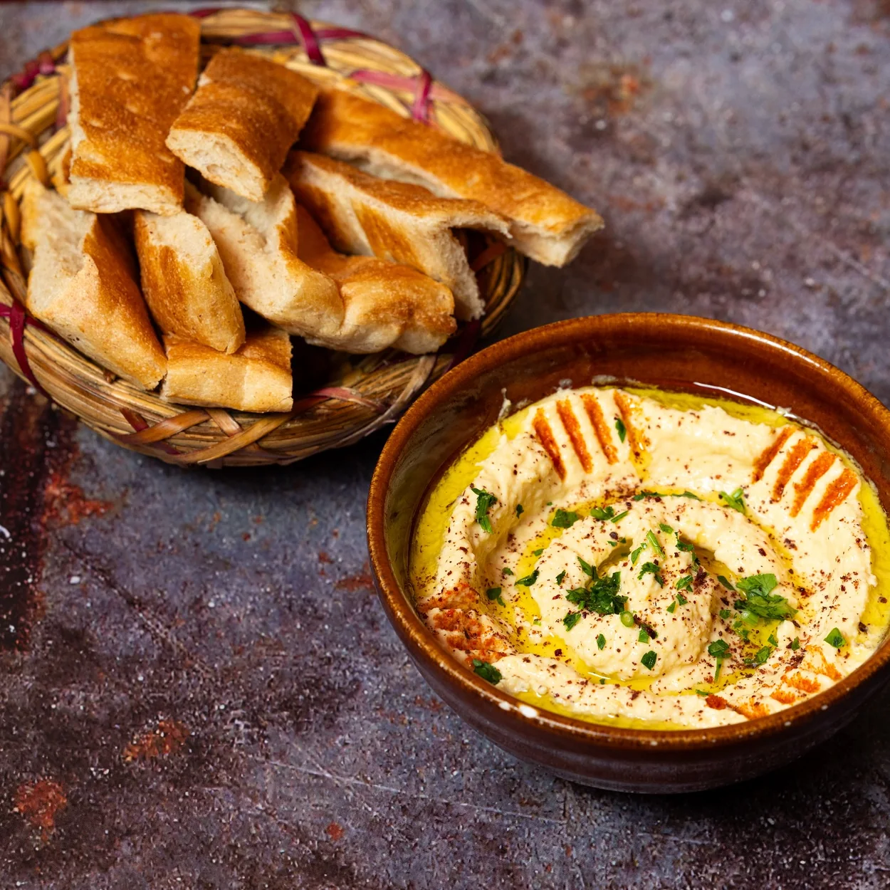 Bab Mansour hummus with olive oil and warm bread