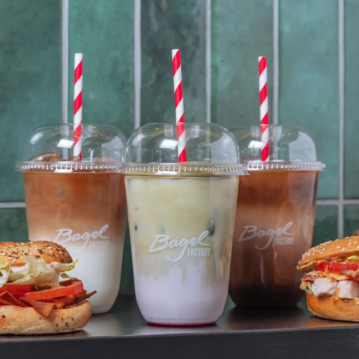 Bagel Factory iced coffees and filled bagels on the counter