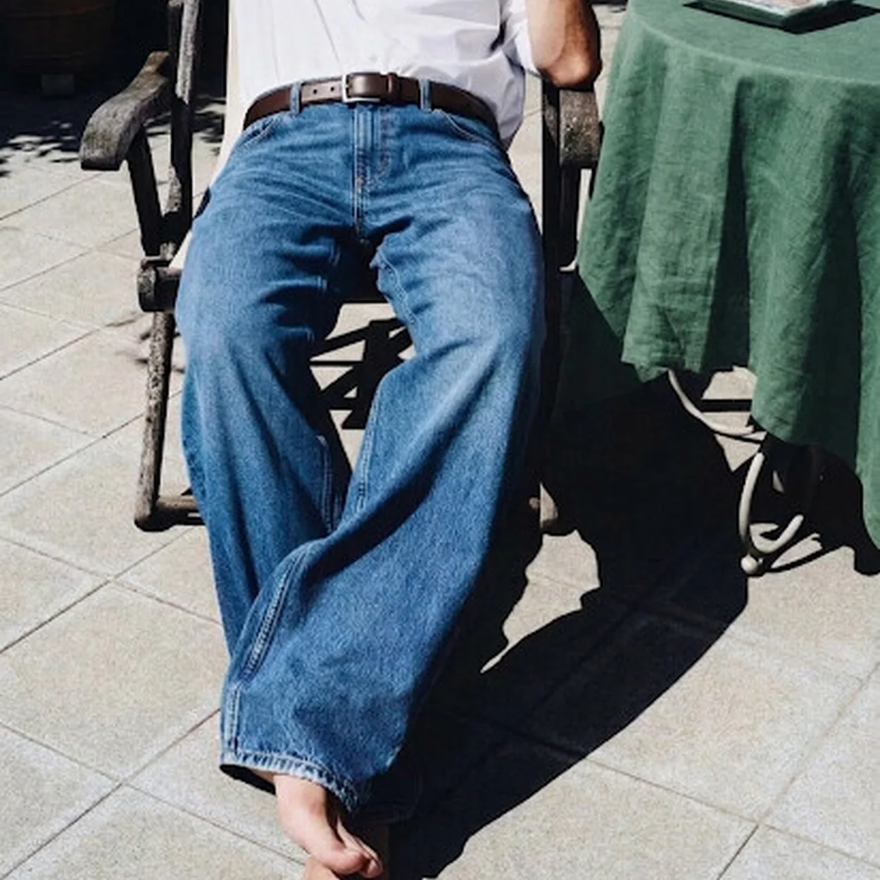 Balibaris wide-leg jeans and white shirt worn on a terrace