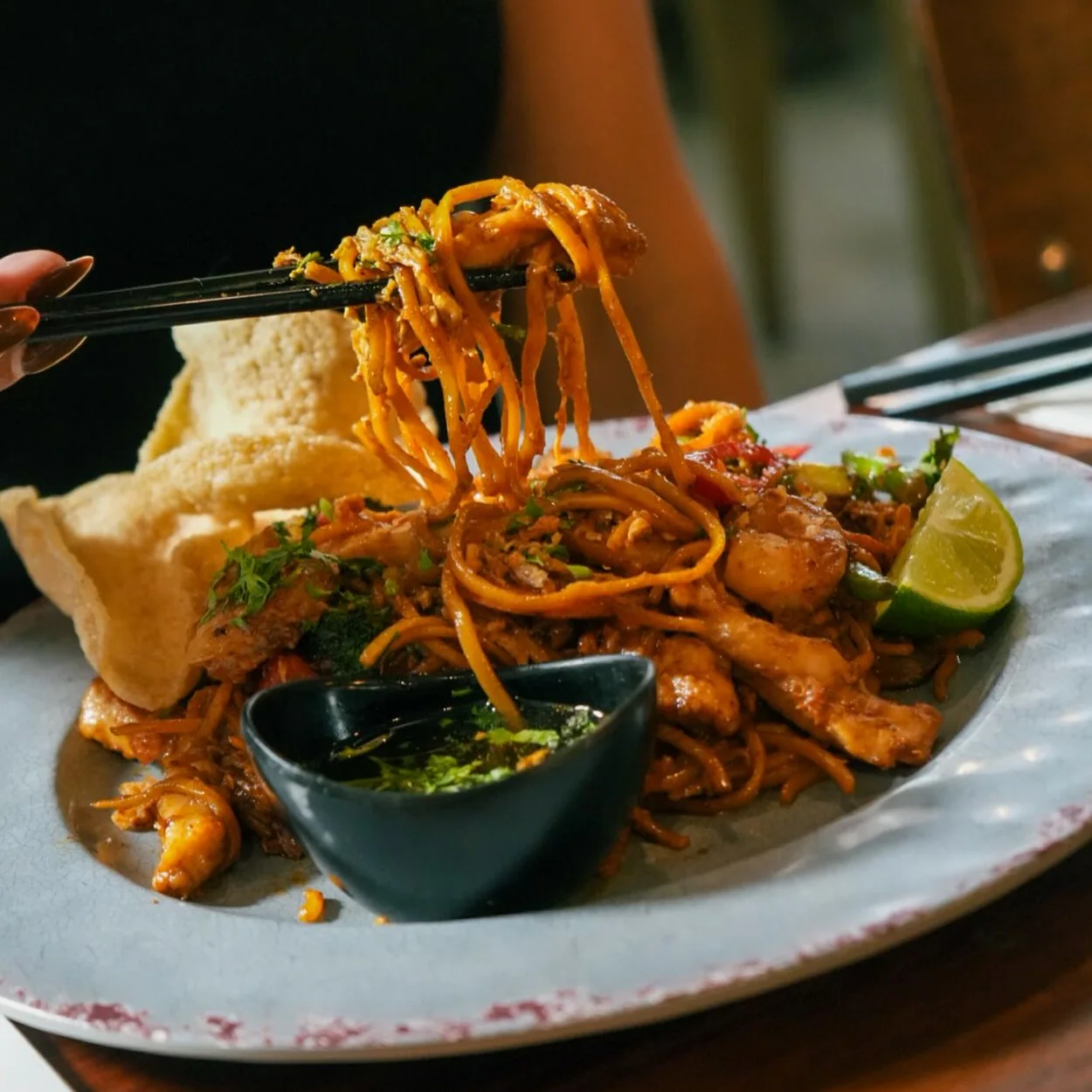 Banana Tree wok-tossed noodles with prawns and crackers