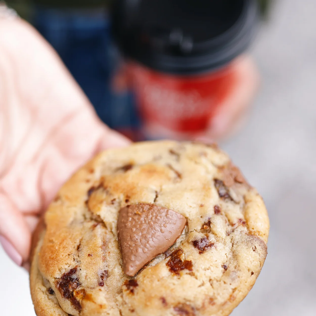 Ben's Cookies milk chocolate chunk cookie held in hand