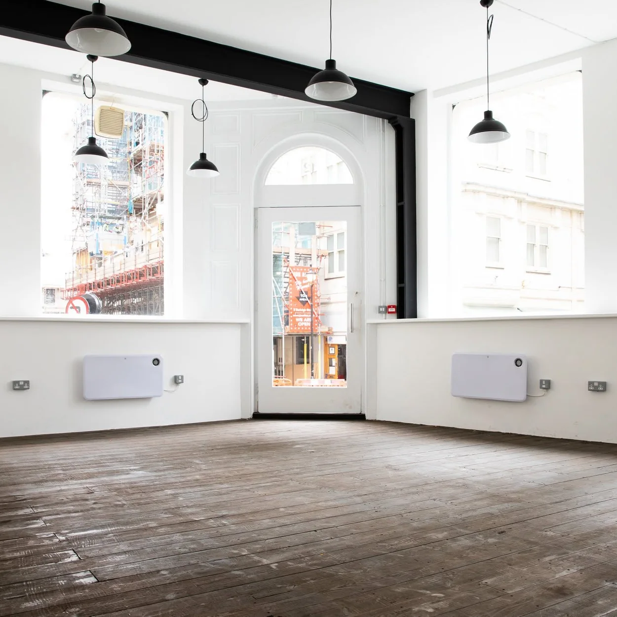 Burleigh Street Townhouse upper floor with period windows and bare boards