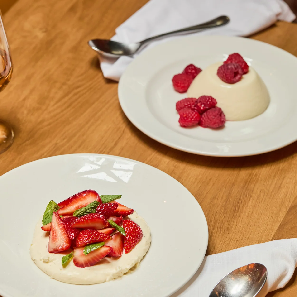Café Murano panna cotta desserts with raspberries and strawberries