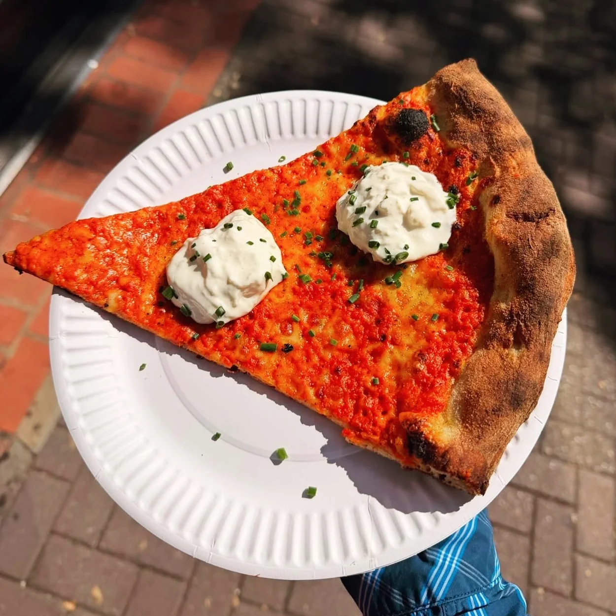 Carmy's slice topped with stracciatella