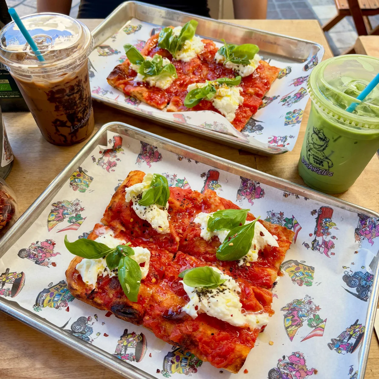 Chill Since '93 pizza squares with burrata and basil