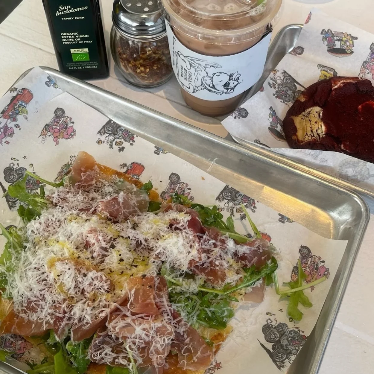 Chill Since '93 pizza with cured meat and rocket
