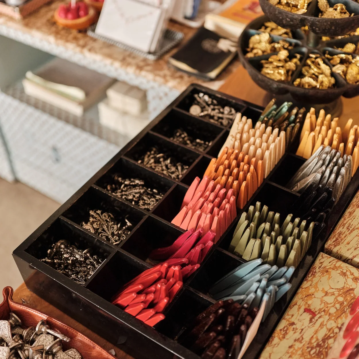 Choosing Keeping tray of coloured pencils and writing tools
