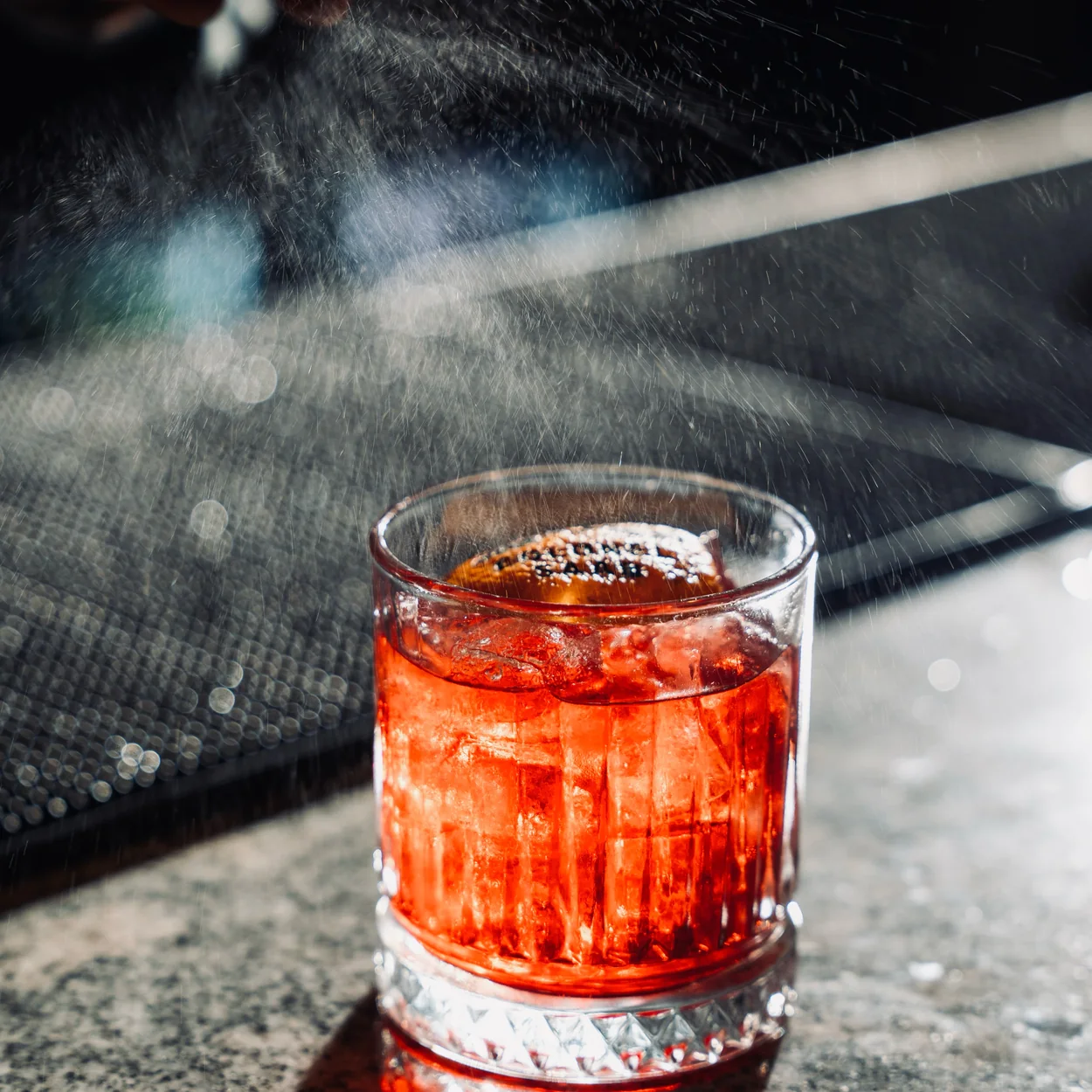 Colonel Saab red cocktail on the bar at the restaurant