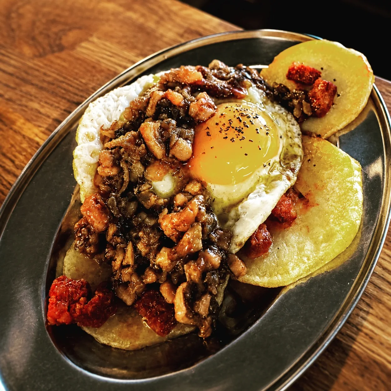 Condesa Covent Garden, a tapas plate of fried eggs, potatoes and chorizo