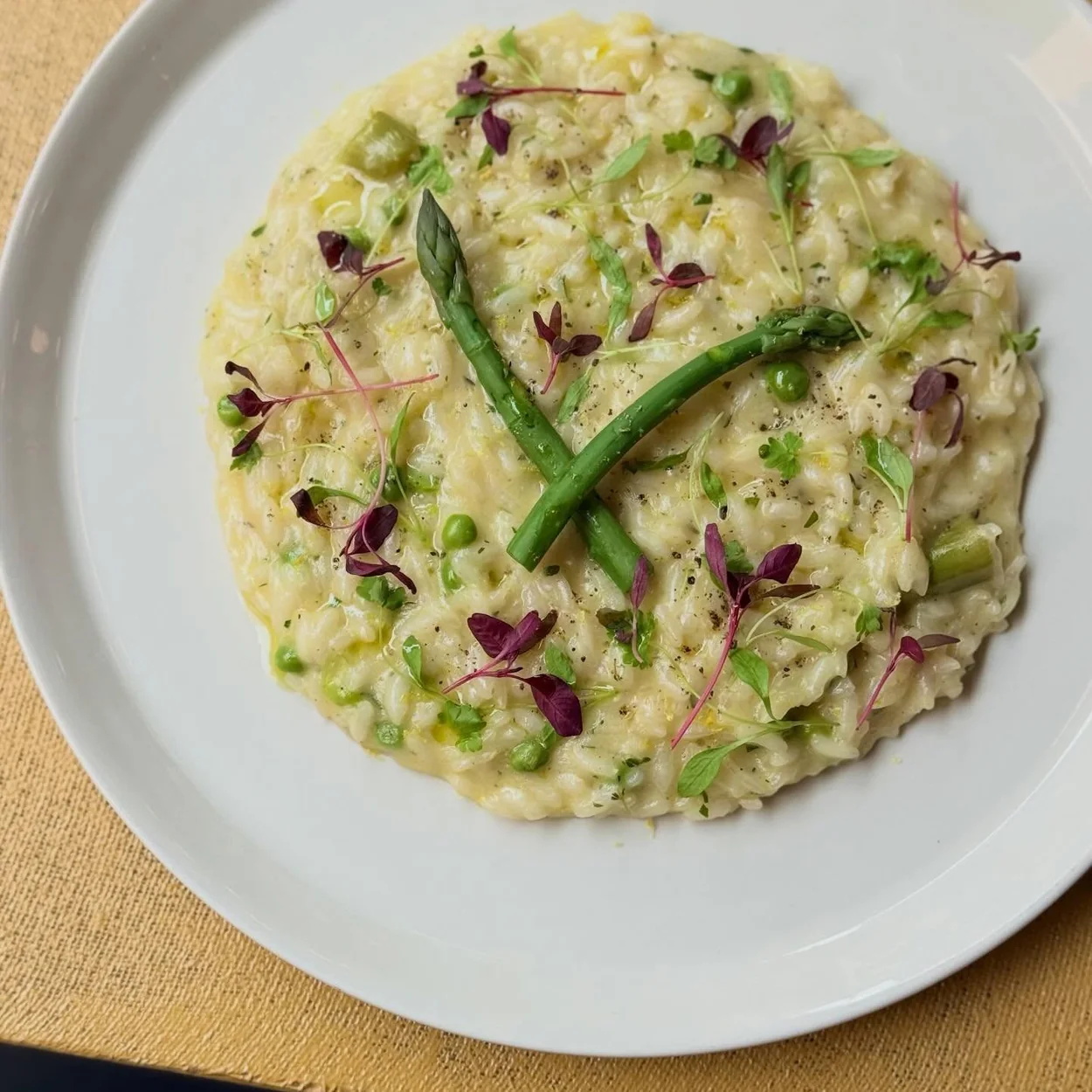 Dalla Terra asparagus risotto plated at the restaurant