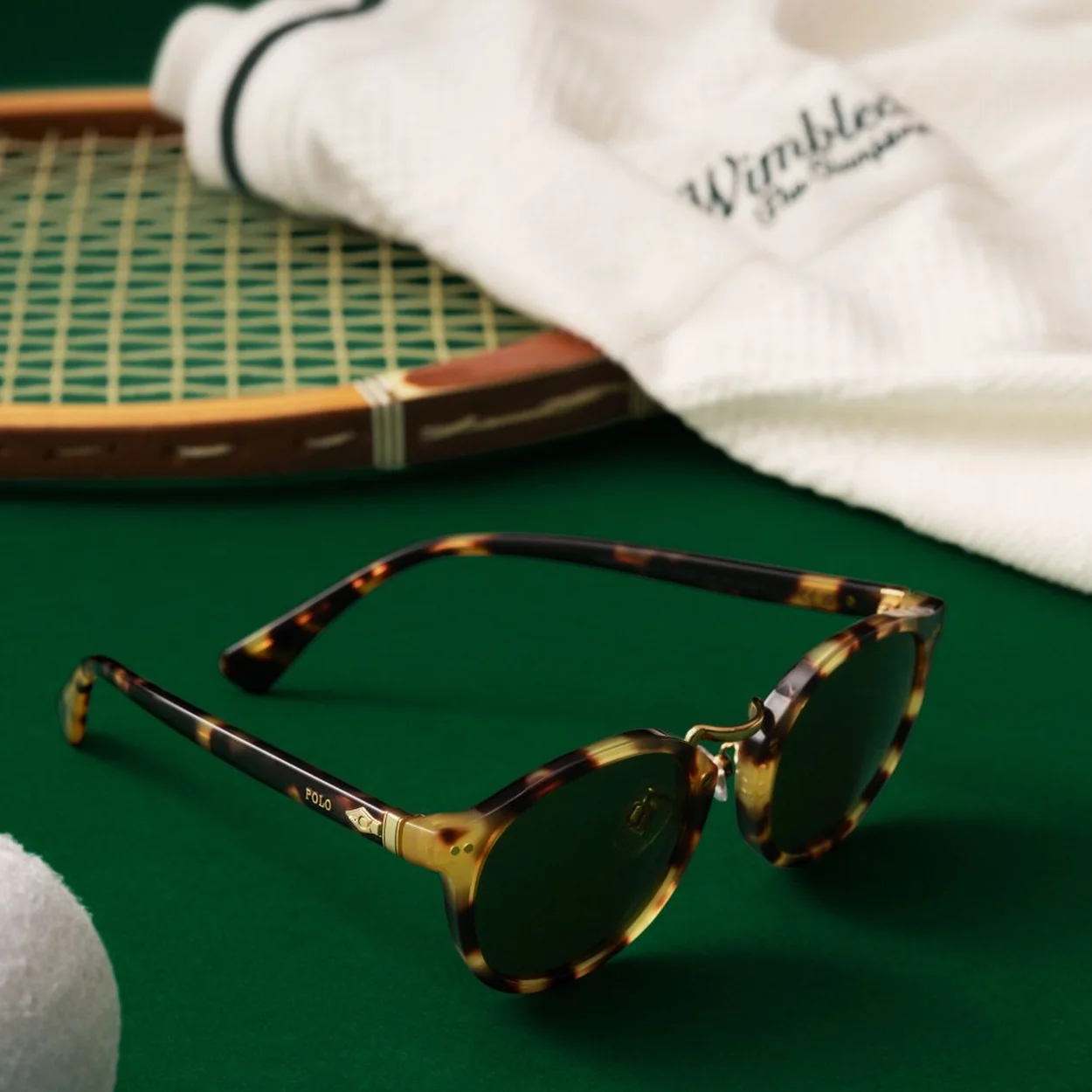 David Clulow Opticians tortoiseshell sunglasses with green lenses