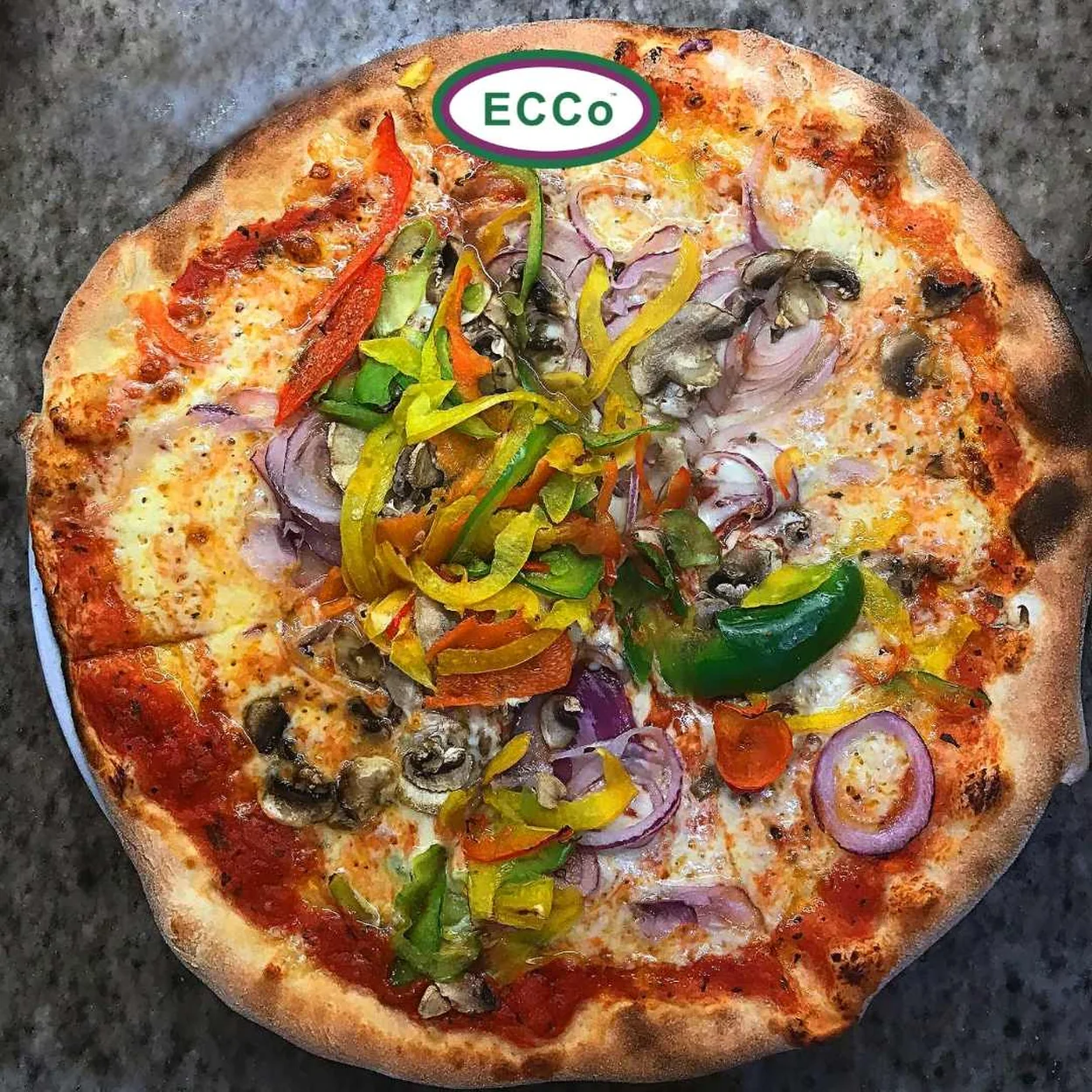 Ecco Pizza vegetable pizza with peppers, onion and mushrooms