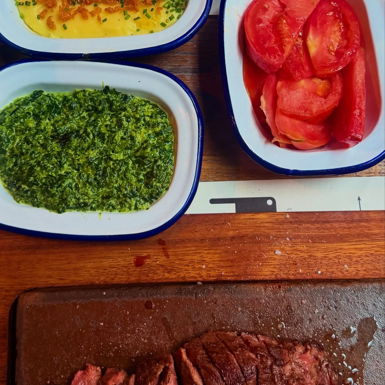 Flat Iron Covent Garden steak with tomato salad and greens