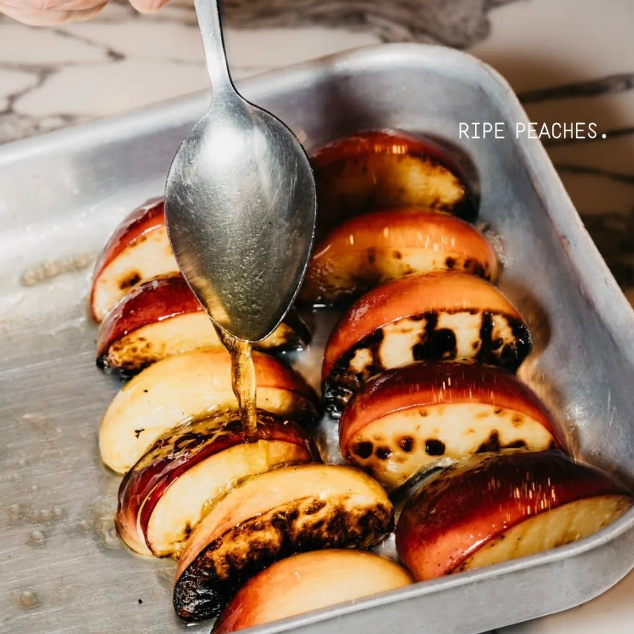 Franco Manca Covent Garden roasted peaches in a baking tray