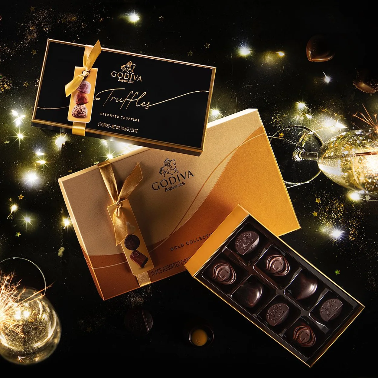 Godiva Gold Collection boxes and truffles under festive lights