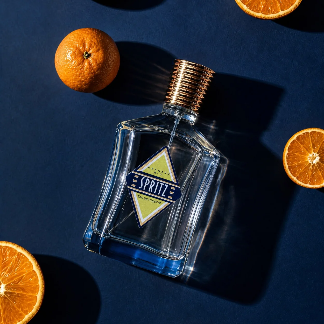 Granado Spritz eau de toilette bottle surrounded by sliced oranges