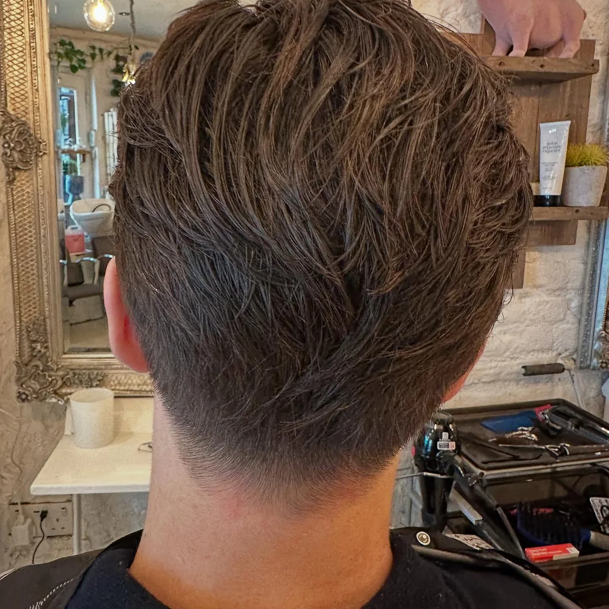 Hair by Fairy men's textured cut and taper at the salon chair