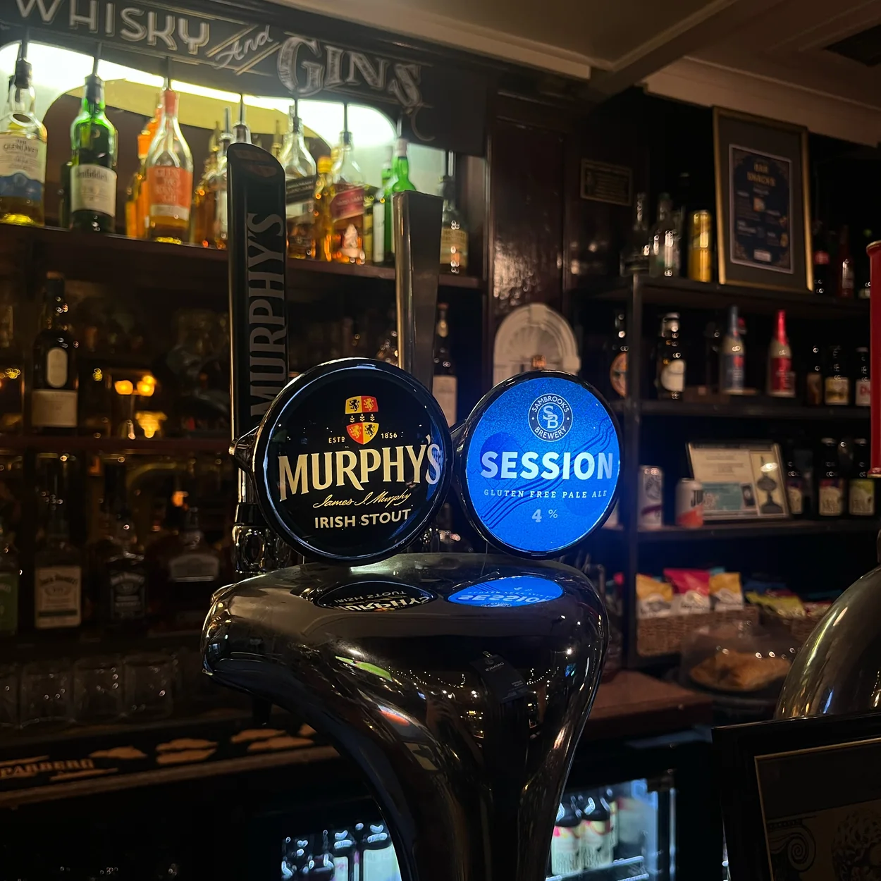 Beer taps and back bar spirits at The Hercules Pillars, Holborn