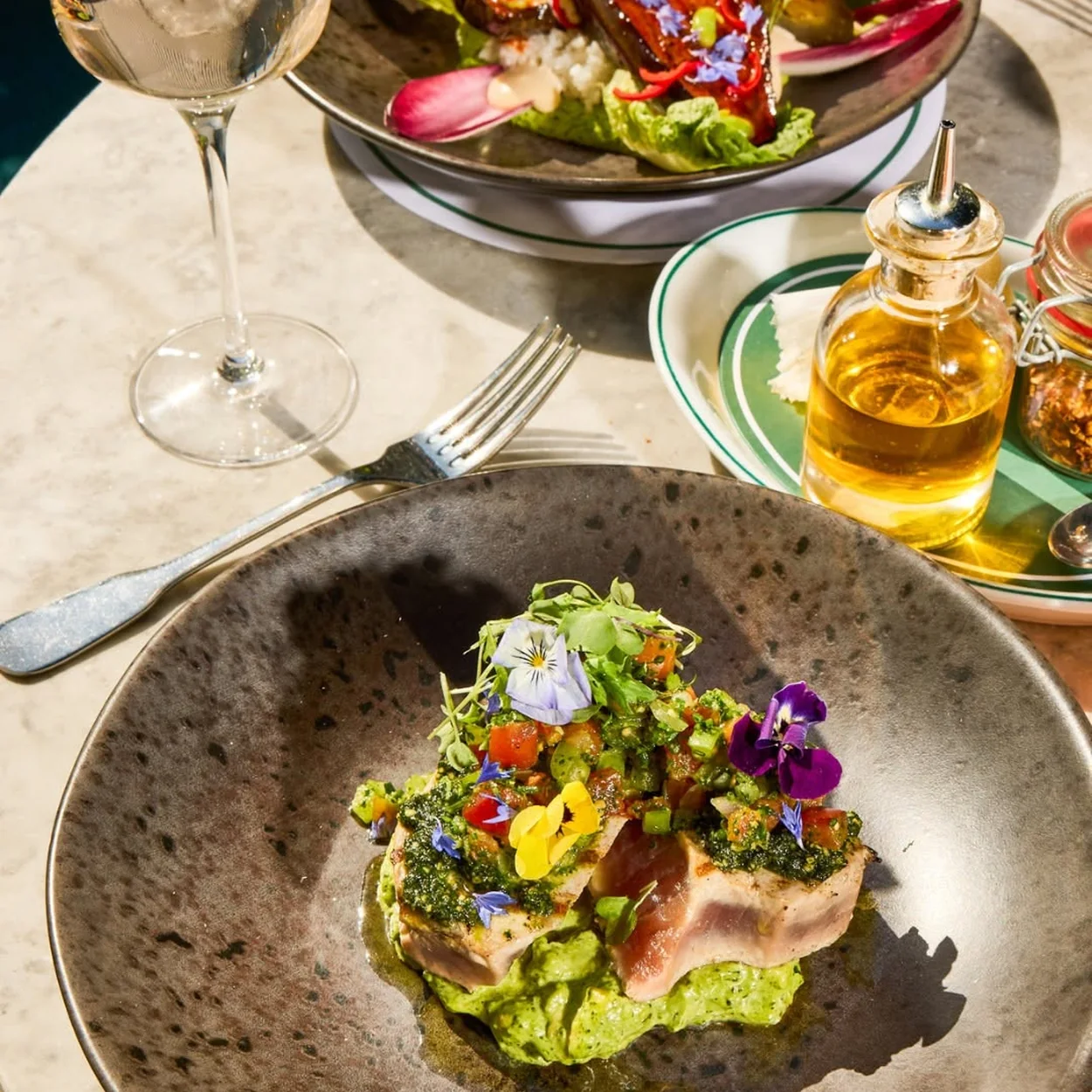 The Ivy Market Grill avocado and smoked salmon starter with edible flowers