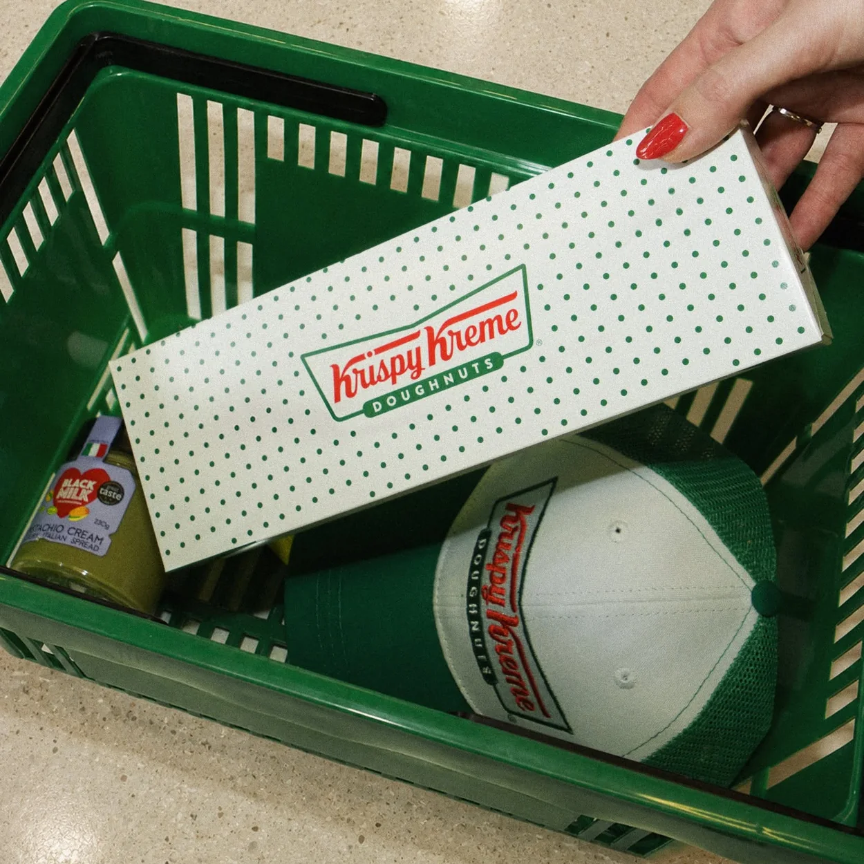 Krispy Kreme doughnut box in a shopping basket