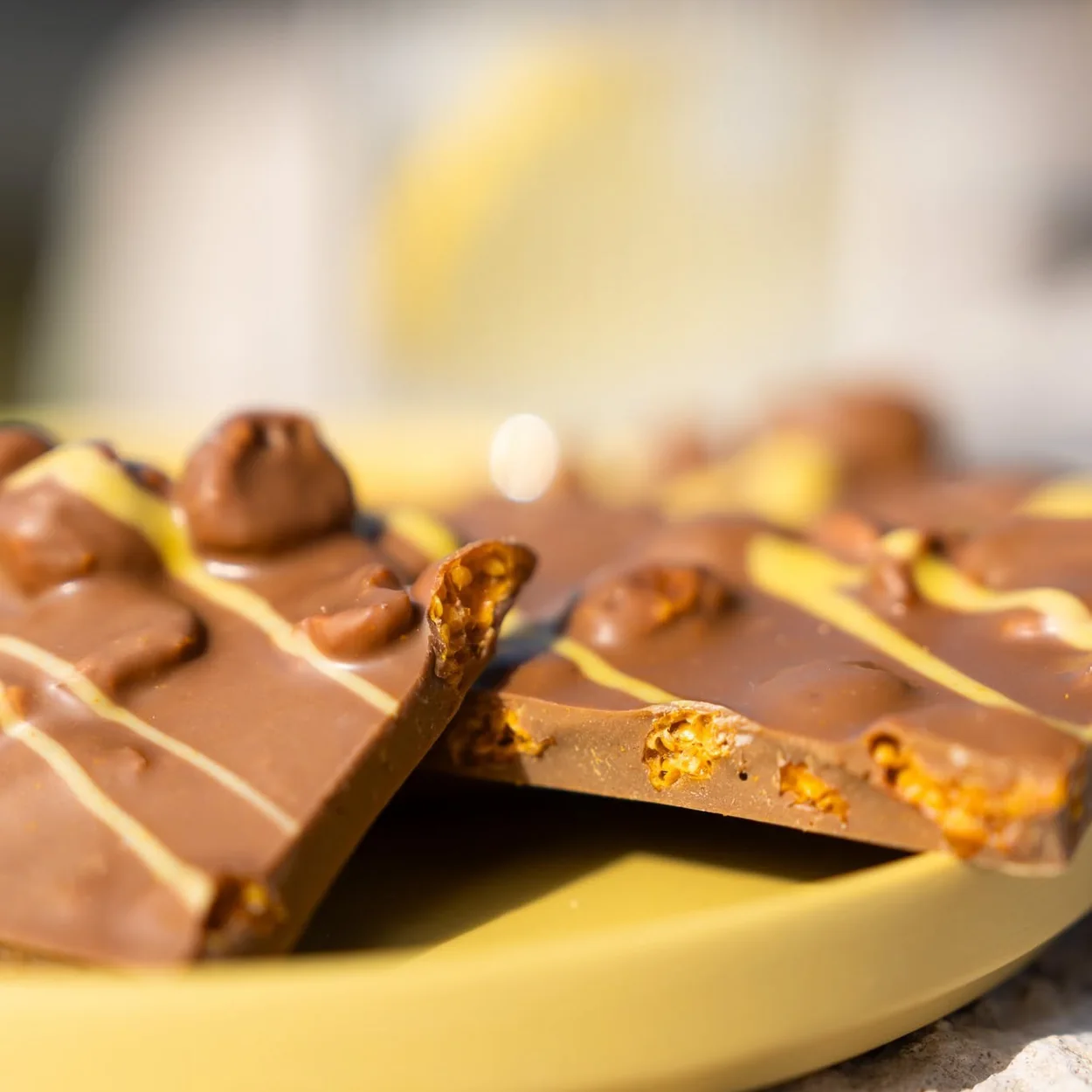 Läderach milk chocolate FrischSchoggi with whole nuts