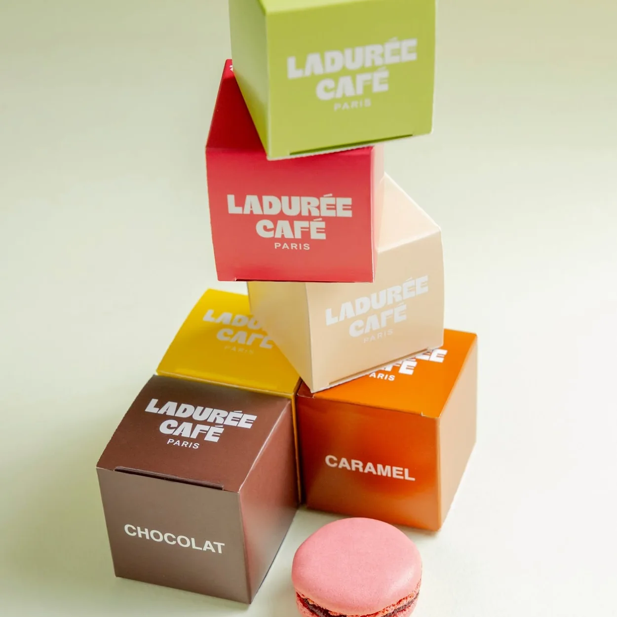 Ladurée Covent Garden macaron gift boxes stacked in house colours