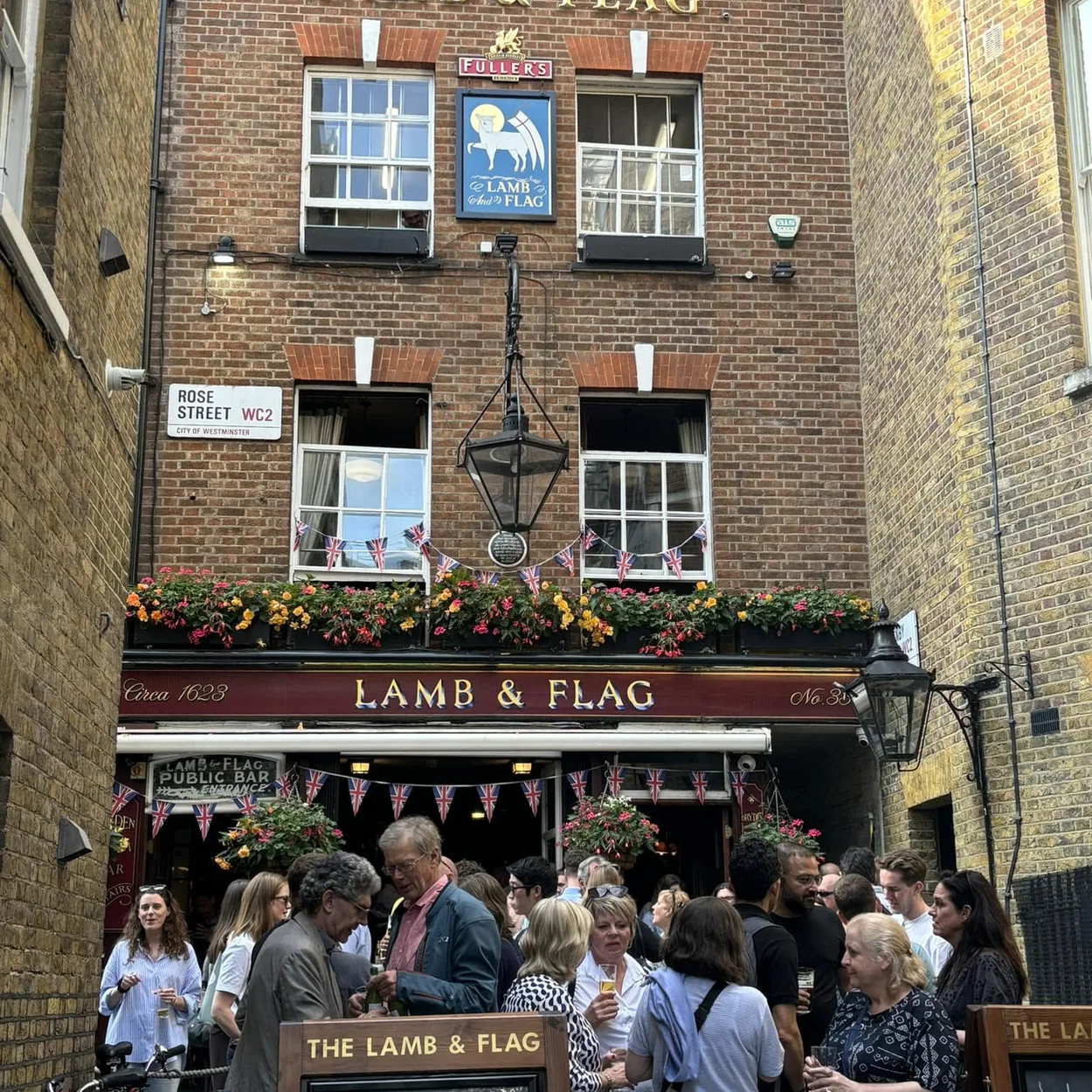 Evening crowd outside the Lamb & Flag, Covent Garden