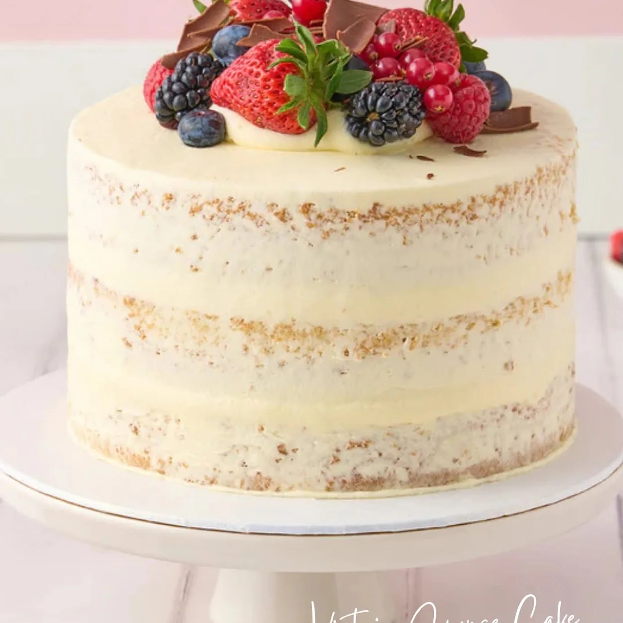 Lola's Cupcakes Victoria sponge cake topped with berries