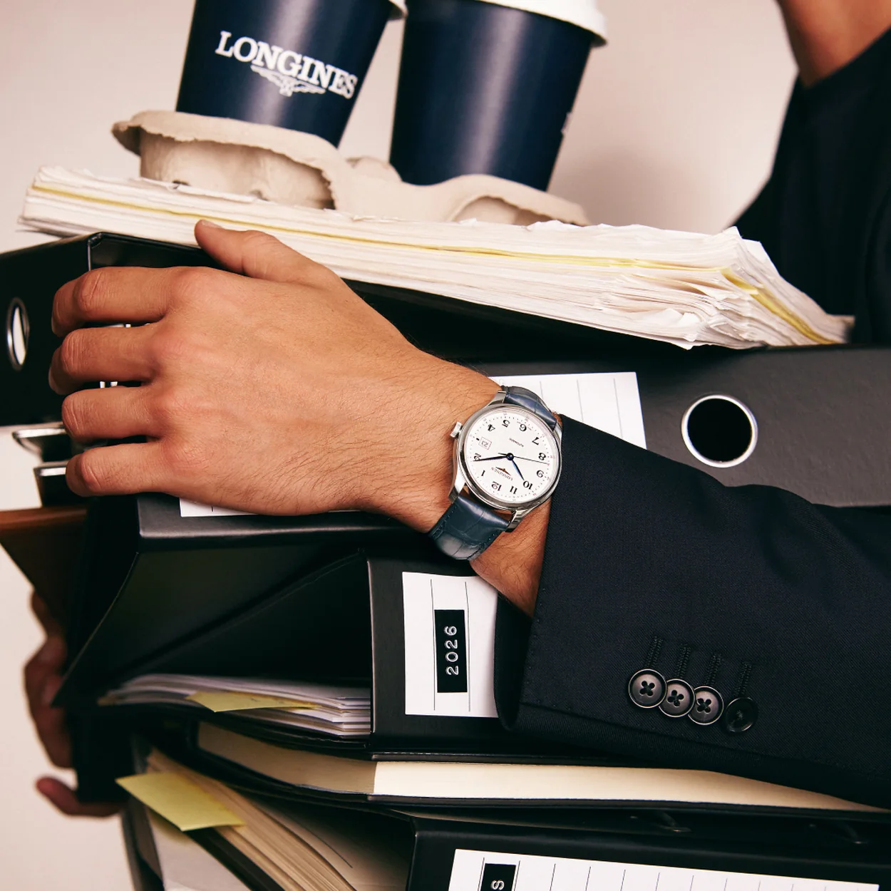 Longines steel watch worn on the wrist