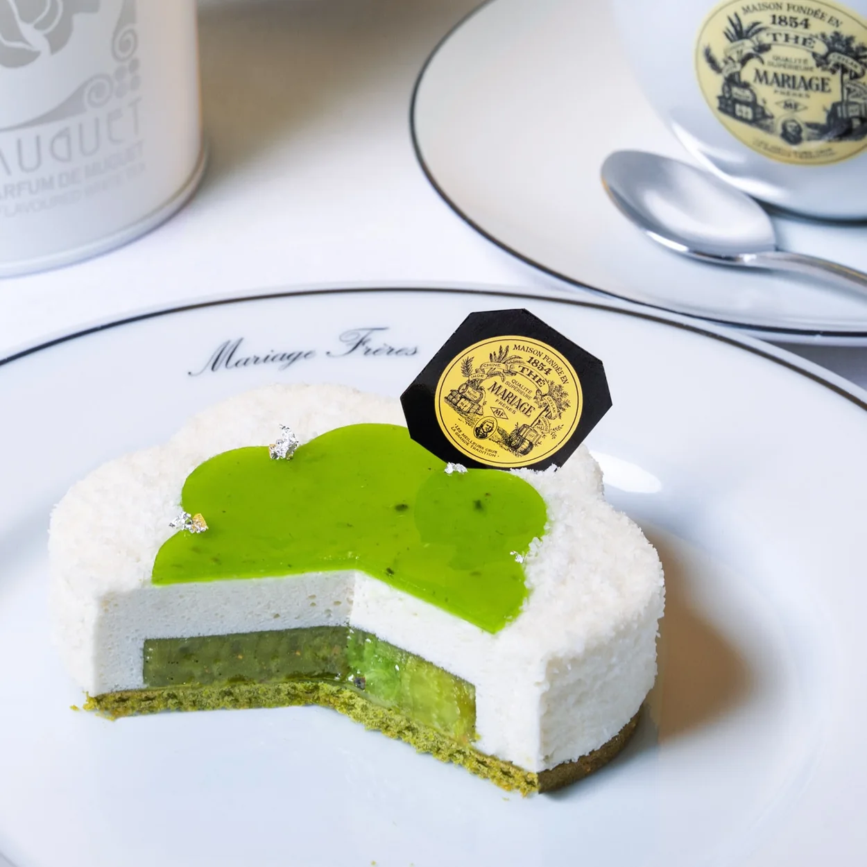 Mariage Freres matcha tea pastry on a branded plate