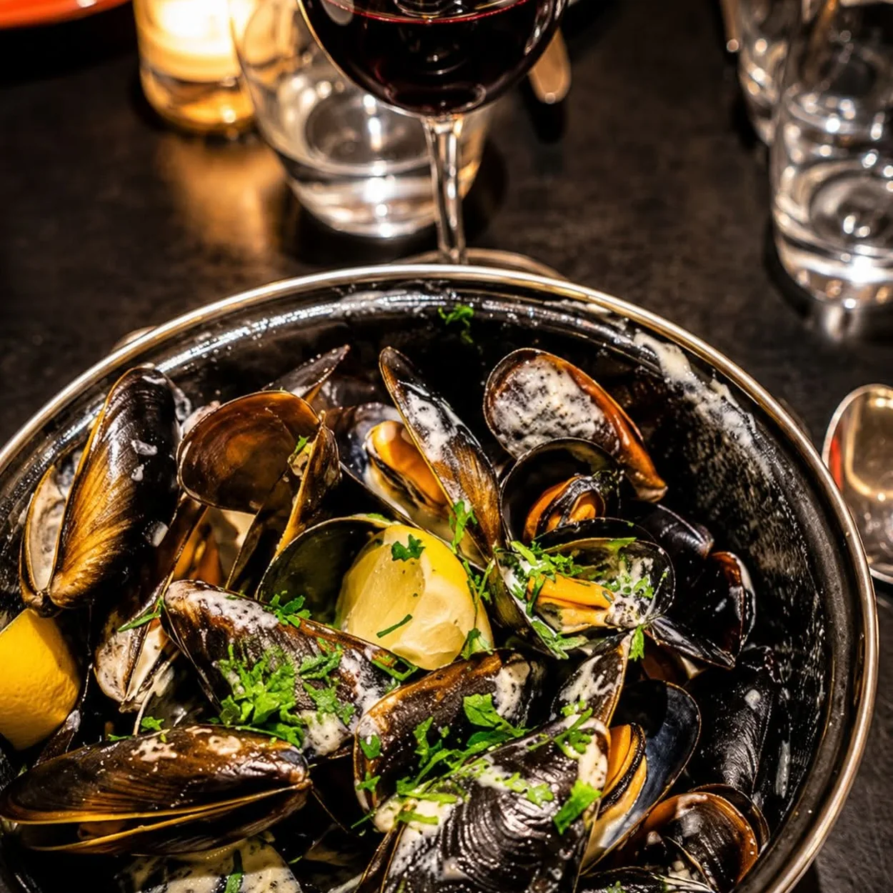 Mon Plaisir moules with a glass of red wine