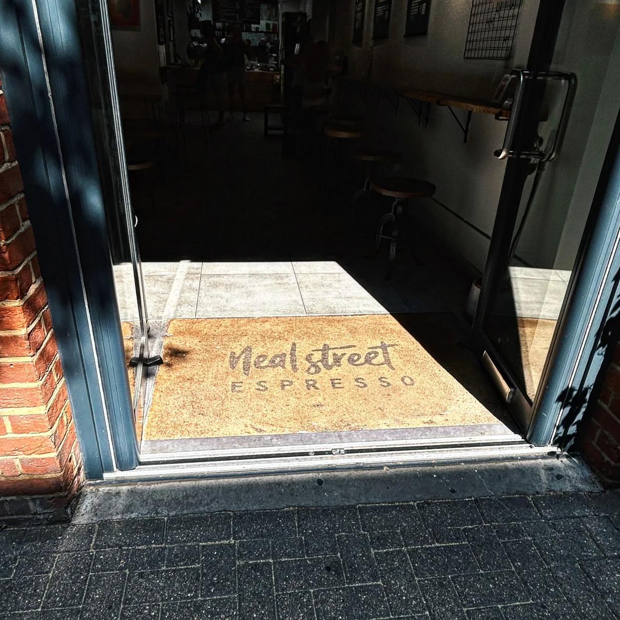Neal Street Espresso entrance doormat on Neal Street