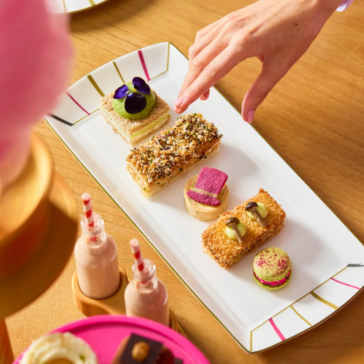One Aldwych afternoon tea pastries on a long plate