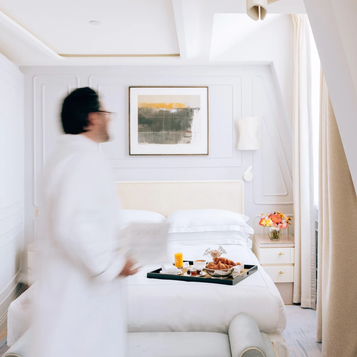 One Aldwych bedroom with breakfast tray being delivered