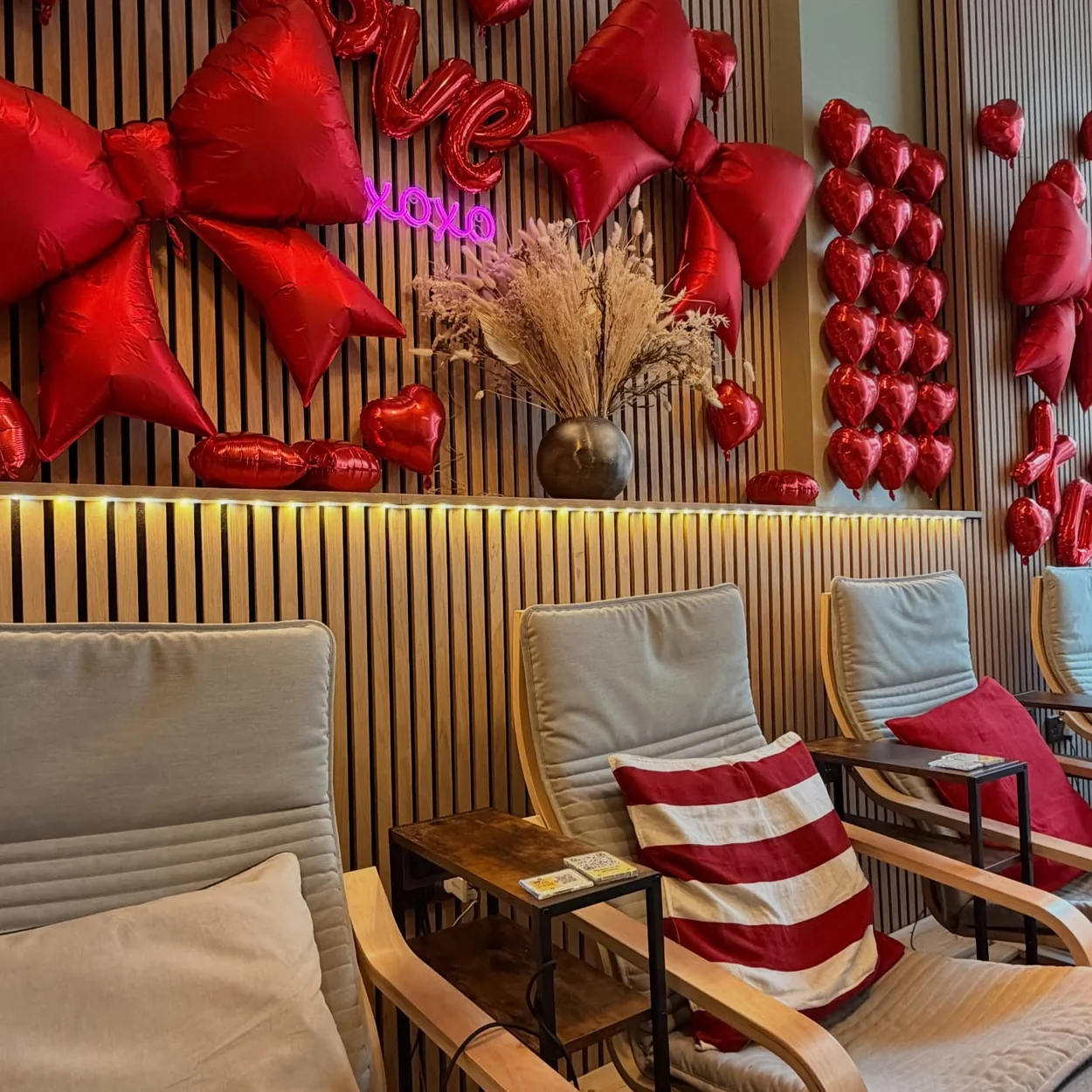 Opulence Thai Spa waiting area with cushioned armchairs