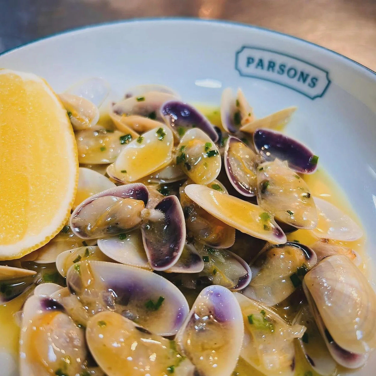 Parsons clams in butter sauce with lemon