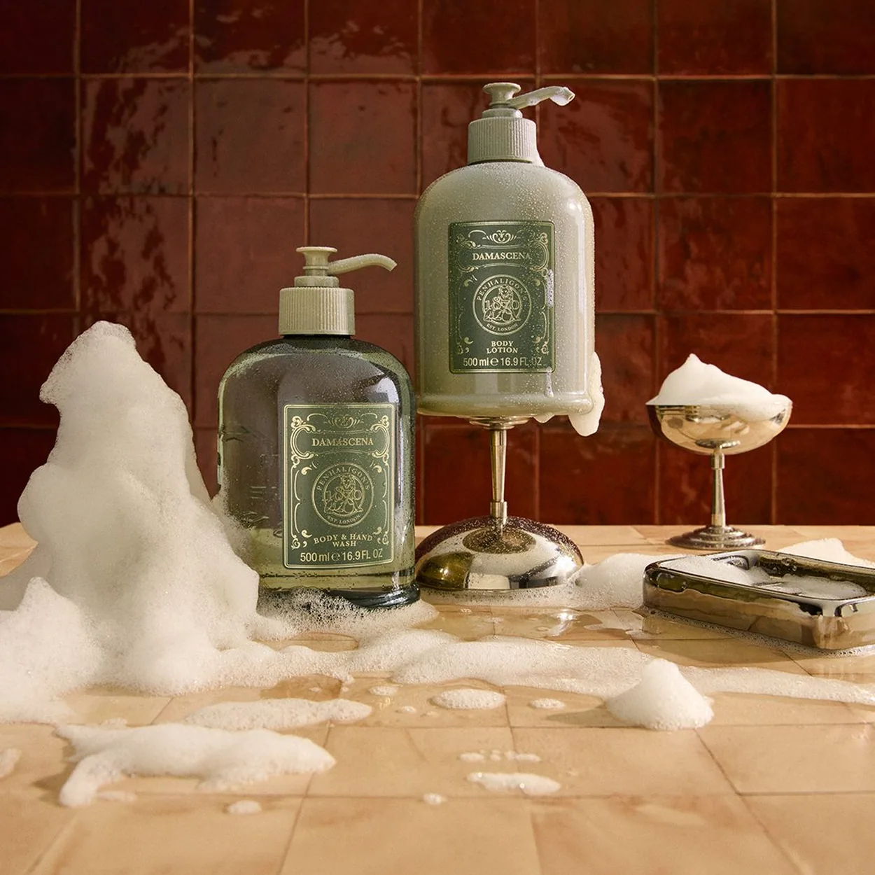 Penhaligon's hand wash and lotion bottles on a tiled bathroom counter