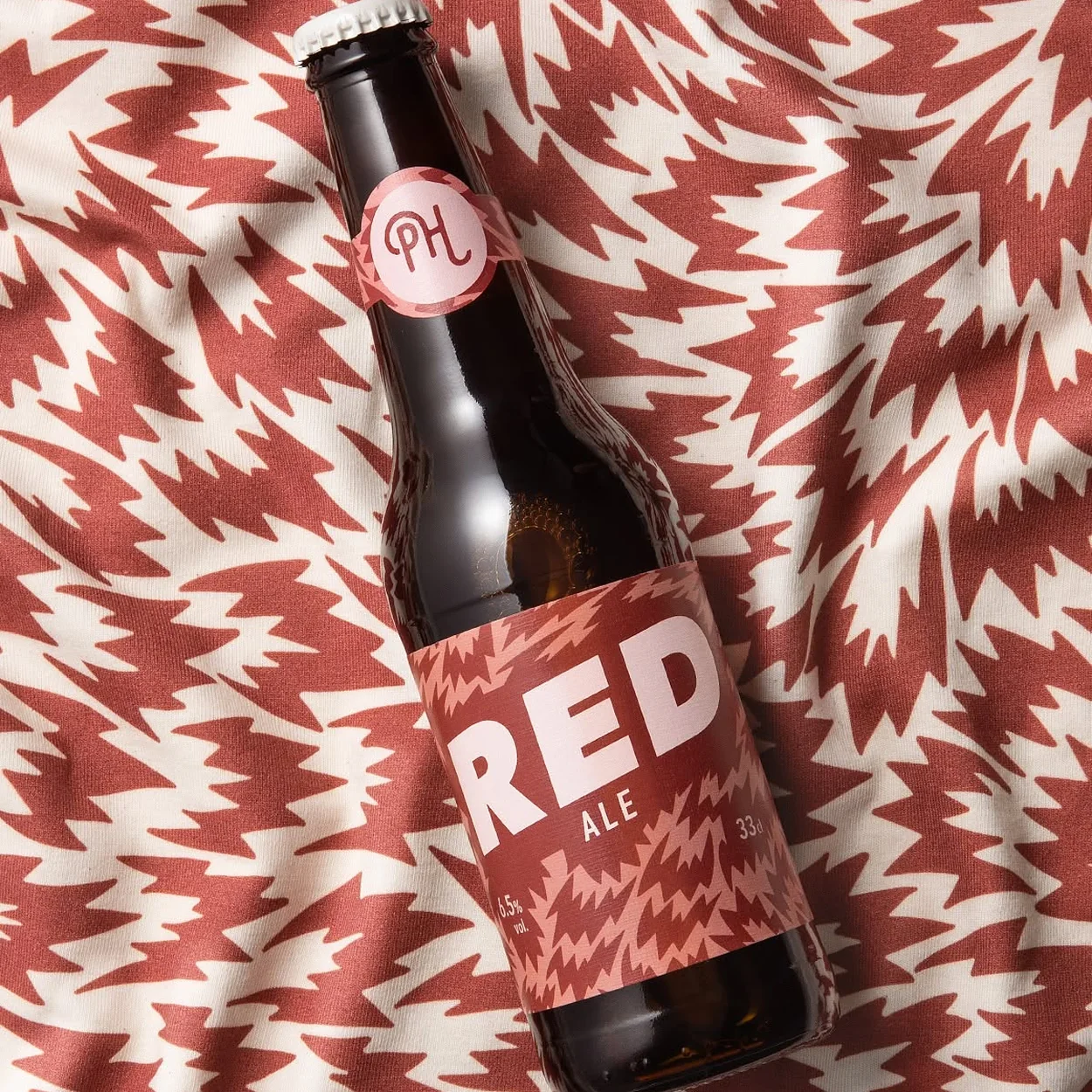 Poke House own-label red ale bottle