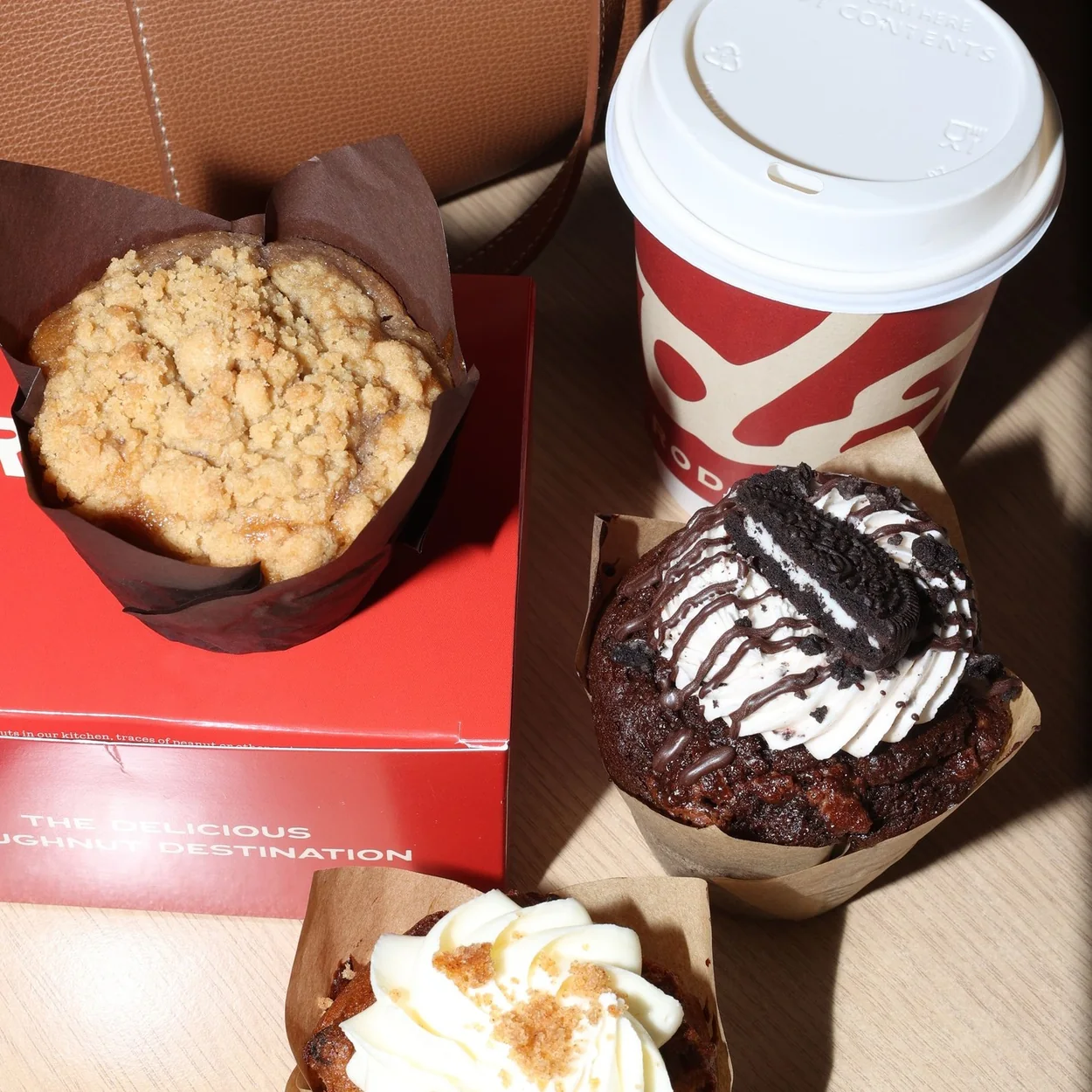 Rodeo Doughnuts box of doughnuts with a takeaway coffee