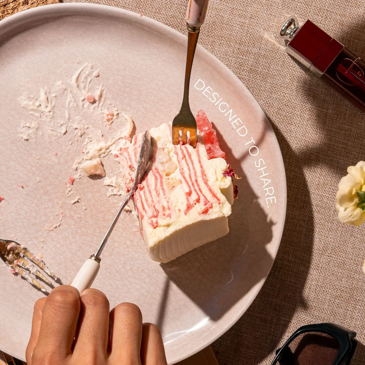 Sakurado mille crepe slice on a pink plate