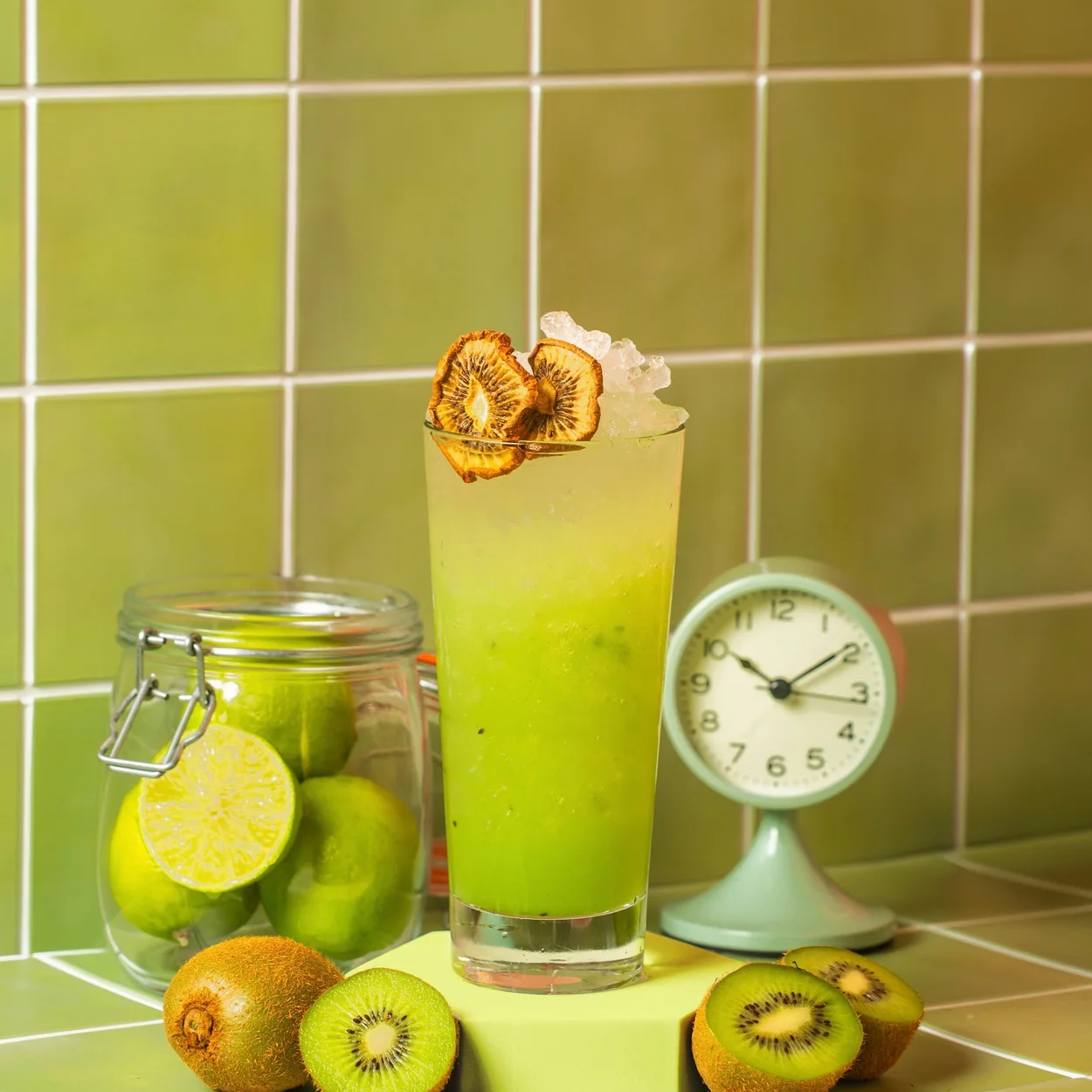 Simmons Bar kiwi cocktail with dried fruit garnish on green tiles