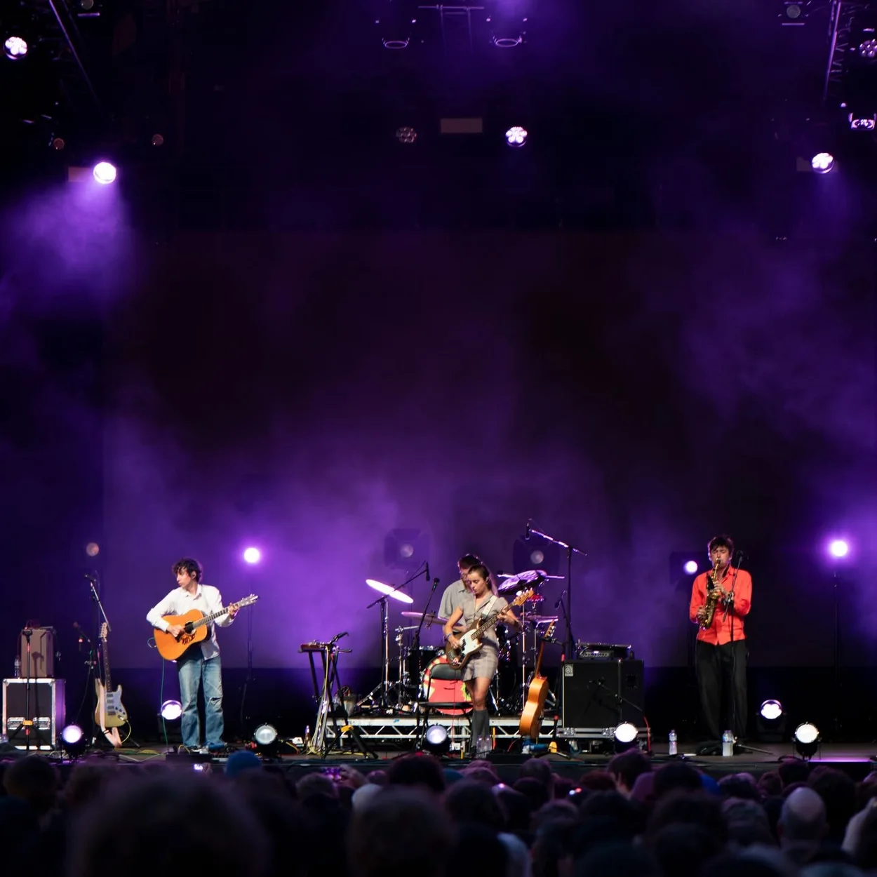 Evening concert stage lit in purple in the courtyard of Somerset House