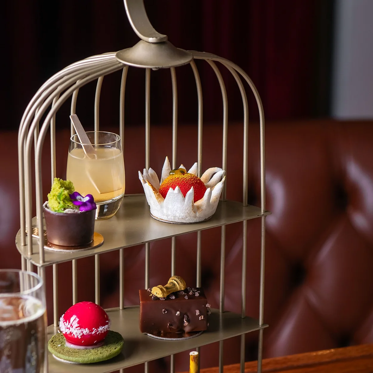 St Martins Lane afternoon tea served in a birdcage stand